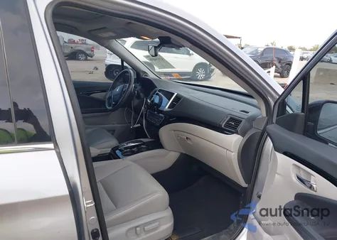 2017 Honda Pilot Touring z USA, uszkodzony, nr VIN 5FNYF5H98HB045265